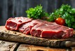 raw meat placed on a rustic wooden surface