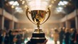 © Premreuthai - Closeup of a trophy held by a business professional, success symbols and certificates in background