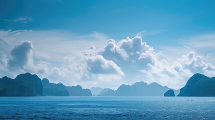 Sticker - Tranquil Ocean View with Cloud-Capped Mountain Range