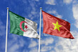 3d illustration. Algeria and Vietnam Flag waving in sky. High detailed waving flag. 3D render. Waving in sky. Flags fluttered in the cloudy sky.