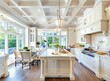 White kitchen with island and dining area in a luxury home, stock photo contest winner