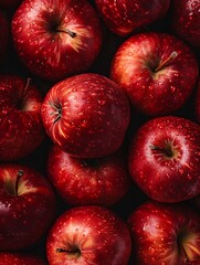 Wall Mural - Plenty of crimson apples. Delicious and succulent. Apple-filled backdrop. Premium image.