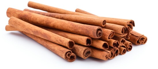 Wall Mural - Cinnamon sticks on a white background