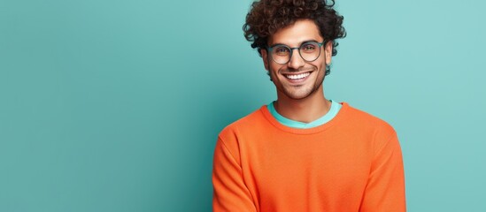 Poster - Young man with curly hair and glasses smiling