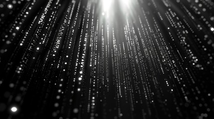 A binary code pattern cascading down a dark background, symbolizing the fundamental language of computers.