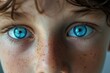 Close up of a child's eyes with freckles, suitable for various projects