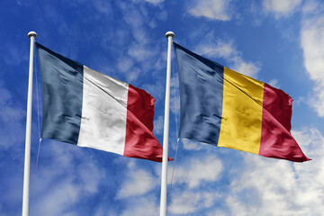 3d illustration. France and Chad Flag waving in sky. High detailed waving flag. 3D render. Waving in sky. Flags fluttered in the cloudy sky.