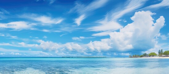 Aufkleber - A serene beach with azure waters and sandy shore