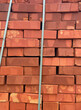 Stacked red bricks background texture