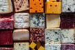 A top view of various types and colors of cheese.