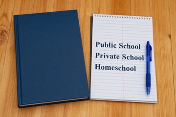 Sticker -  Public vs private vs homeschool schools with retro old blue book with notepad and pen