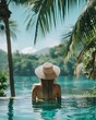 © Vlad Kapusta - back view of woman in pool on summer vacation