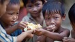 © Muhammad - Kids sharing a small piece of bread among themselves.