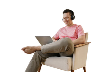 A male freelance programmer uses a laptop cut out
