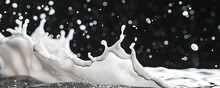 Isolated Milk Splash Liquid Effect On Black Background.