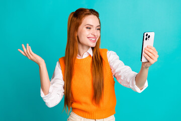 Wall Mural - Photo of cute lovely girl blogger dressed trendy orange clothes share news live stream talk isolated on cyan color background