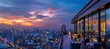 © Philipp - Cityscape rooftop bar  prime sunset spot with panoramic urban skyline views for enjoying drinks