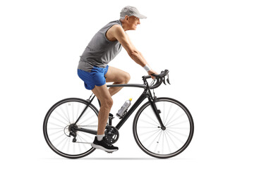 Sticker - Elderly man in sportswear riding a bicycle