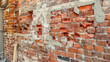 © Дмитрий Симаков - A brick wall with a hole in it. The wall is made of red bricks
