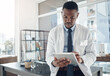 © peopleimages.com - Medical, doctor and tablet for work, office and telehealth for clinic, serious and online for healthcare. Workplace, hospital and internet and technology for black man, science and research of staff