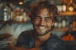 © Larisa AI - Portrait of a joyful man with curly hair, warm smile, and a light beard, set in a cozy indoor environment