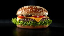 Beautiful Cheeze Burger On A Black Background 