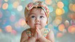 © basketman23 - Charming baby in colorful attire,  captivating the viewer with innocence against a calm pastel background