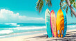 Colorful surfboards standing on a beach with beautiful sea and palm trees background in summer time