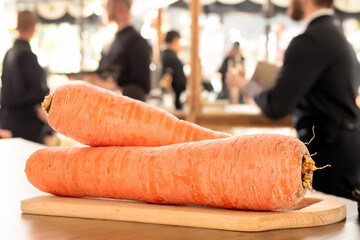 Canvas Print - Peeled sweet carrots on the table in the restaurant kitchen.