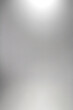 © DilSpace - An abstract, silver gradient background with high resolution. It’s plain, smooth, and soft lighting, suitable for portrait studio photography.