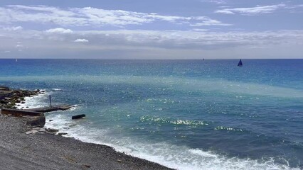 Wall Mural - spiaggia e mare mediterraneo a genova in italia, beach and mediterranean sea in genoa in italy