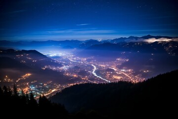 Poster - b'Night view of a valley with a river running through it'