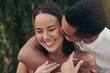 © peopleimages.com - Happy couple, nature or hug with kiss on holiday with support, care or smile in marriage or outdoor vacation. Excited, man and woman in park to travel on adventure, date or honeymoon in Indonesia