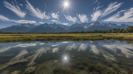 Sticker - b'The sun shines through the clouds over the mountains and reflects on the lake'