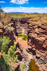 Wall Mural - The natural amphitheatre of the Joffre Gorge, in the remote savanna outback of Karijini National Park, Western Australia.
