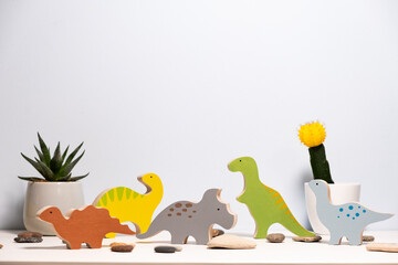 wooden dinosaur figures