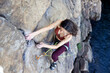 © zhukovvvlad - beautiful girl climbs the rock..