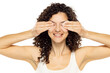 Skincare Concept. Attractive Curly Woman Removing Makeup Using Cotton Pad Cleansing Face Skin Over White Background.