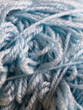 close up of a blue fabric,blue wool texture,close up of wool 