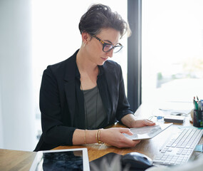 Wall Mural - business woman, office and typing on tablet thinking of email, online report or startup website. fem