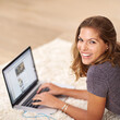 Portrait, research or happy woman on laptop in house to relax for streaming film, video or movie online. Smile, website screen or girl on social media app, blog or technology for subscription in home