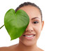 Happy woman, portrait and natural beauty with leaf for skincare or facial treatment on a white studio background. Face of female person, brunette or model with smile for organic green plant on mockup