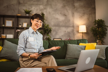 Wall Mural - Mature japanese woman have consultation via video call work from home