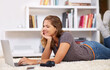 Happy, streaming or girl on laptop in home to relax with internet connection for film, video or movie online. Smile, website blog and woman on social media and technology for subscription in house