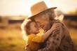 Grandmother with granddaughter family smiling happiness love old woman little girl winter warmth walk child hug embracing care togetherness bonding affection parent support tender relationship outside