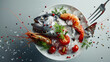 Flying raw whole bream fish and prawns, with ingredients for cooking, Freeze motion, Fork holding the meat, Concept of food preparation in low gravity mode, Separated on smooth gray background