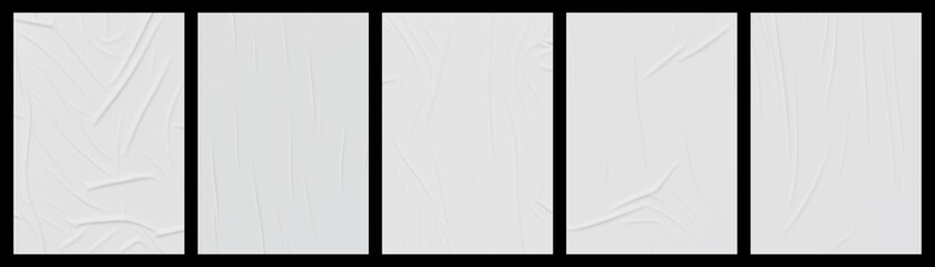 White wrinkled poster template set. Mockup of glued paper isolated on black background.