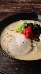 Wall Mural - Japanese Tonkotsu style ramen in black bowl