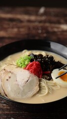 Wall Mural - Japanese Tonkotsu style ramen in black bowl