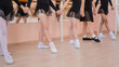 Close-up of five little girls' feet and ballet class. 